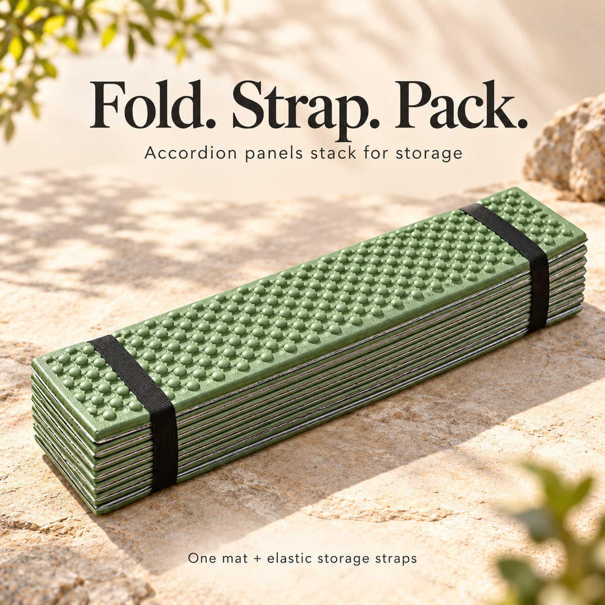 One green foam mat folded into a stack and secured with two elastic storage straps