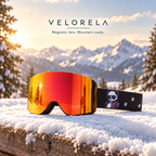 Velorela Red / Panda magnetic snow goggles with the matching black frame and printed strap in an alpine snow scene