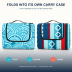 The two picnic blanket patterns folded into integrated carry bundles