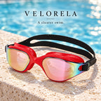 Velorela adult swimming goggles, Red / Purple, photographed at poolside.