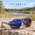 VELORELA Blue Mirror / Amber Base lenses on dry stone