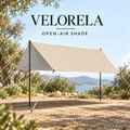 Beige Rectangular camping tarp with Silver inner coating supported by two poles