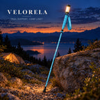 The full sky-blue illuminated trekking pole resting against a rock at blue hour