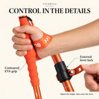 The contoured orange EVA grip with wrist strap and external lever lock